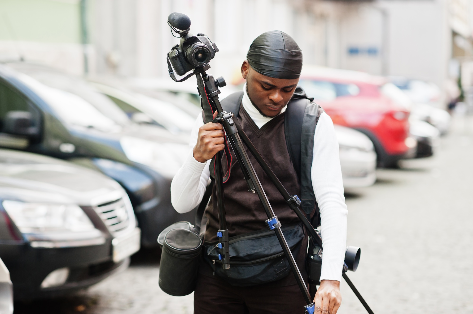 Young professional african american videographer